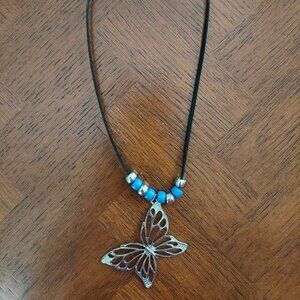 3 necklaces with butterfly or tassel pendants